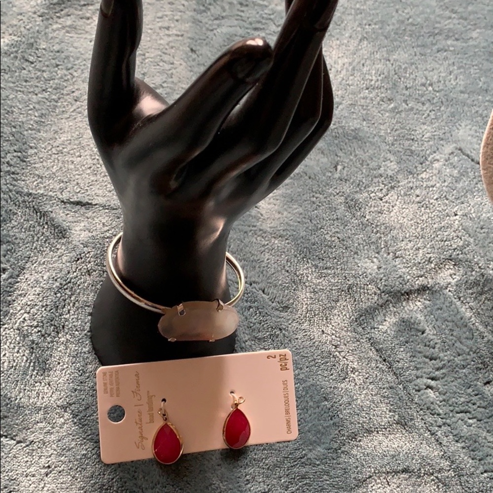 Twist off ends bracelet and 2 charms